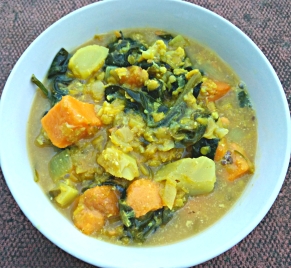 Homemade vegetable soup with cauliflower, red lentils, carrots and spinach